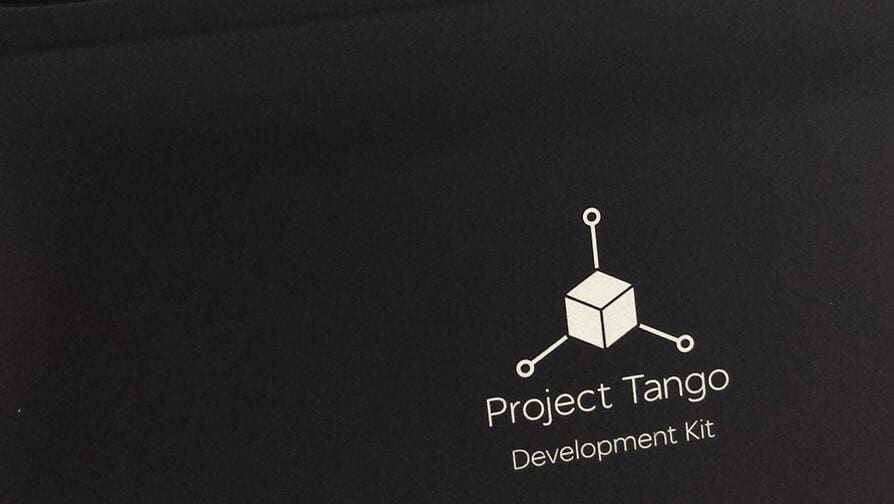Черный фон с логотипом Project Tango и development kit