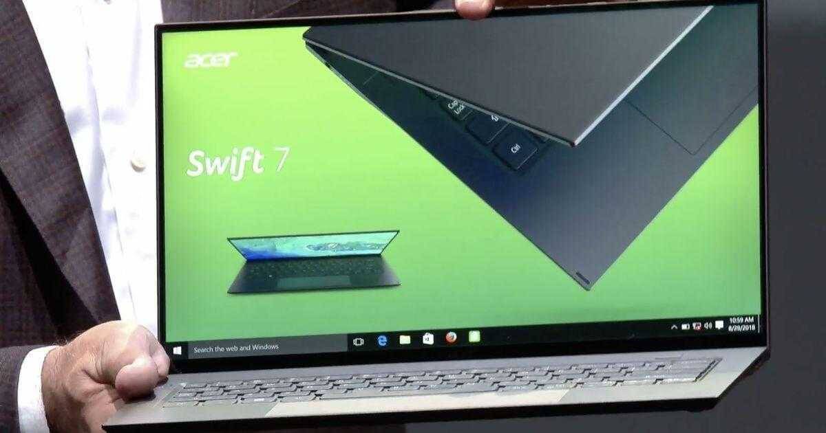 Ноутбук Acer Swift 7 раскрыт под углом показывается экран и клавиатура