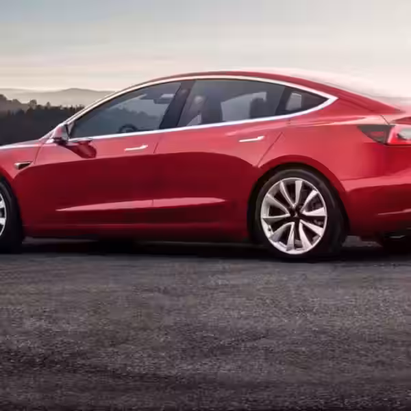 red tesla model 3 sunset e1549437553845