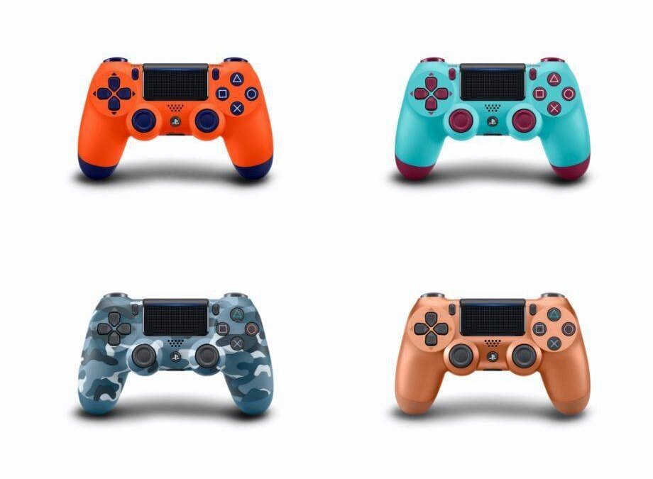 Четыре контроллера DualShock 4 разных расцветок спереди