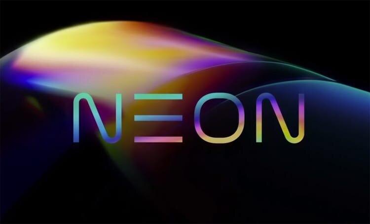 Цветная неоновая надпись NEON на темном фоне