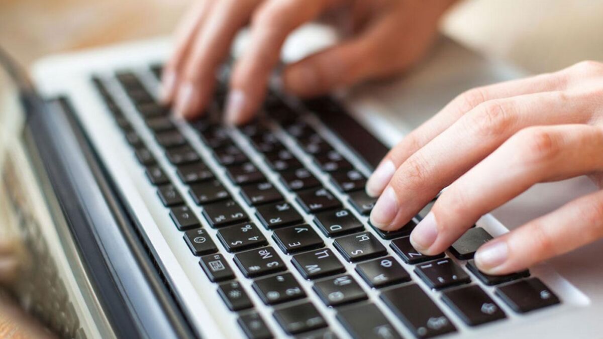hands-keyboard-laptop-computer
