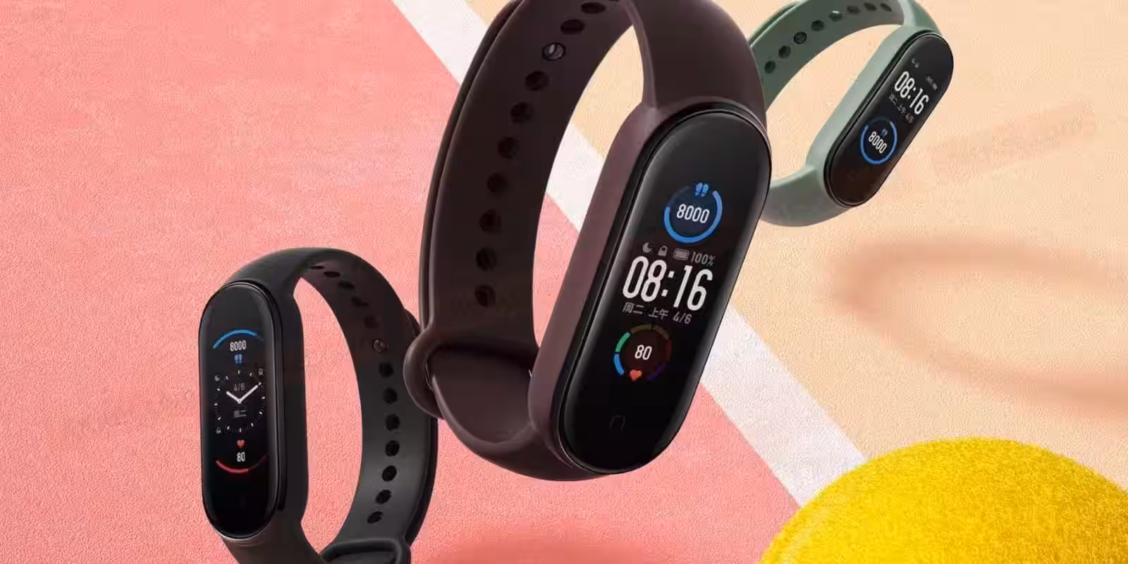Умный браслет Xiaomi Mi Band 6 на фоне цветных поверхностей