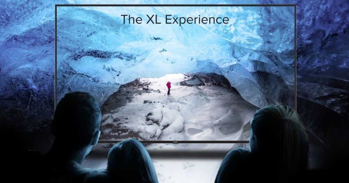 Телевизор Redmi Smart TV X с изображением горной сцены