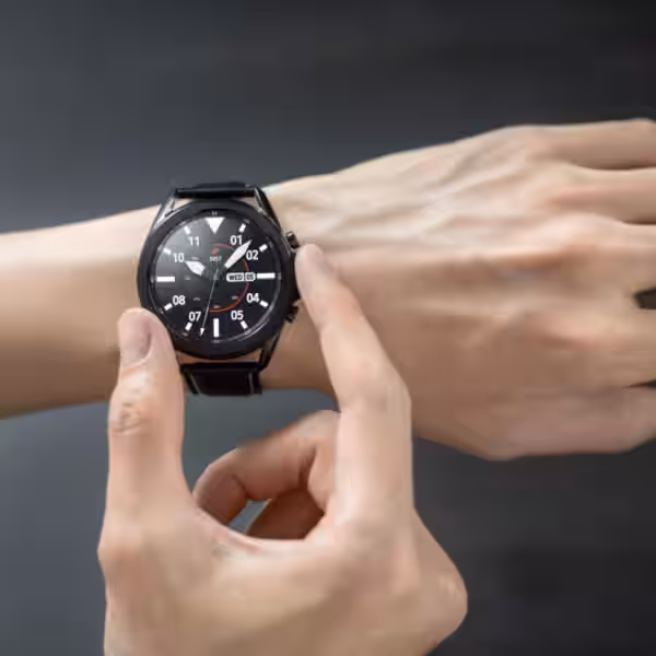 galaxy watch3 mystic black front hands on lifestyle scaled 1
