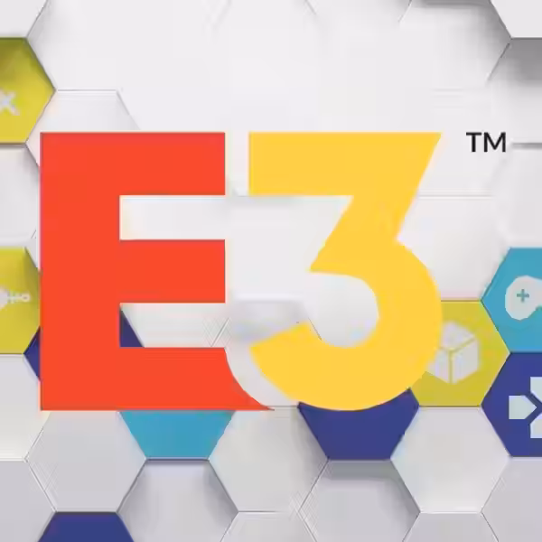 Логотип E3 2022 на фоне гексагональных фигур для игровой выставки E3