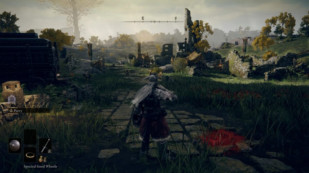 Игровой персонаж с щитом и мечом в окружении руин