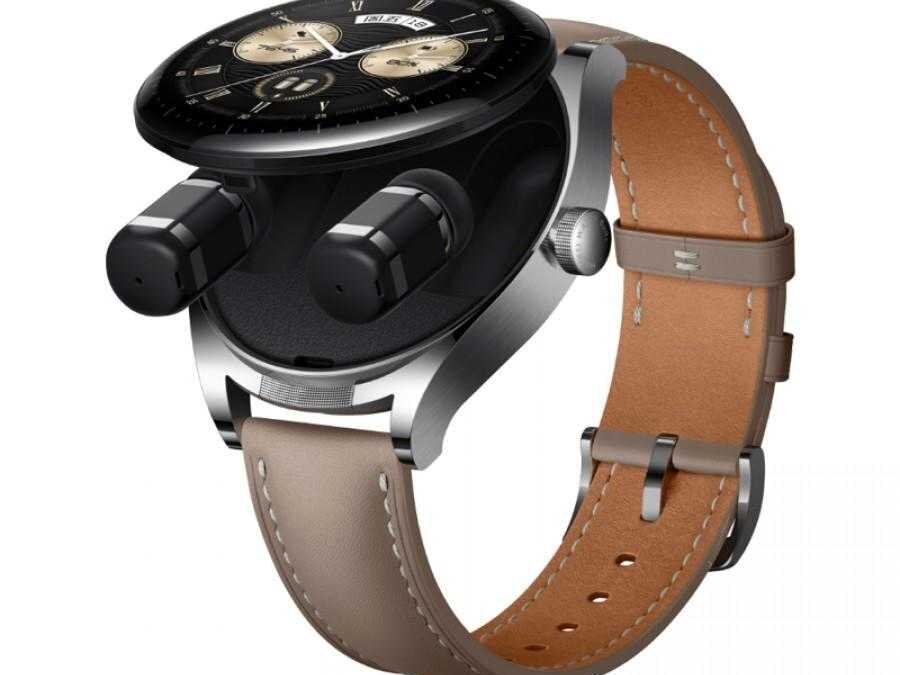 Белый смартфон Redmi Turbo 5 с двойными камерами и логотипом на задней панели