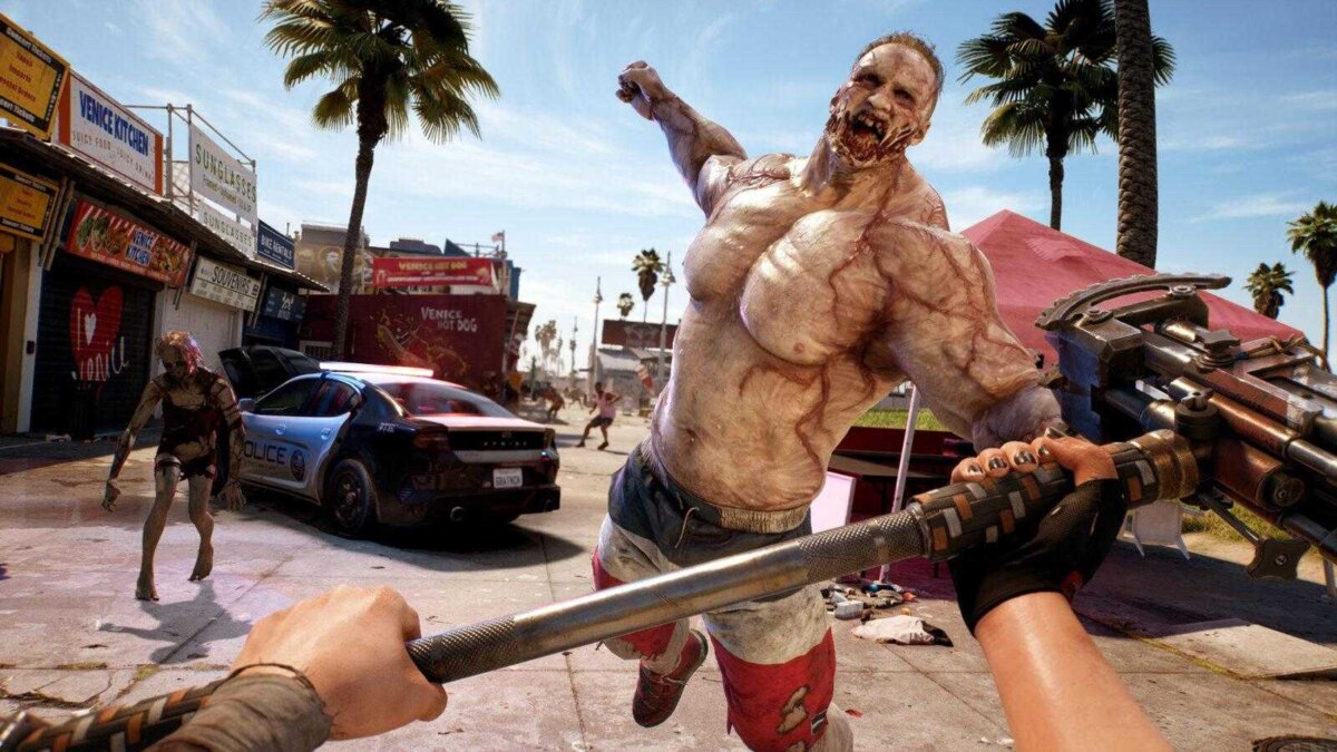 Взгляд с рук на зомби из игры Dead Island 2