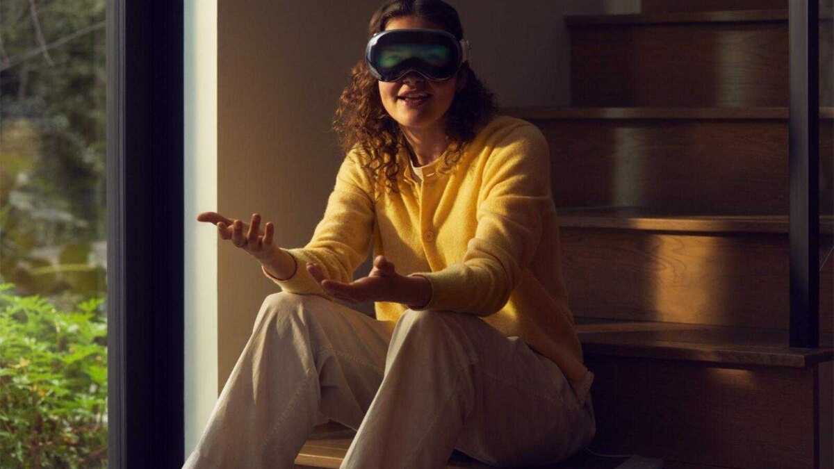 apple wwcd23 vision pro lifestyle with battery facetime