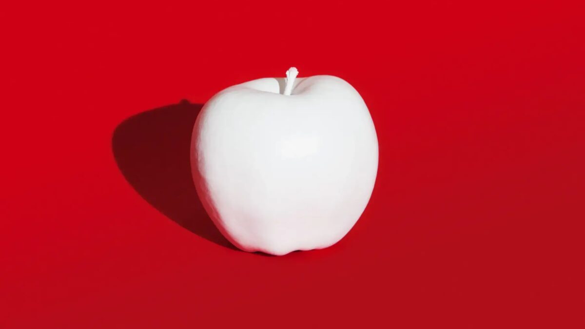 whiteapple redbackground biz gettyimages 740523449