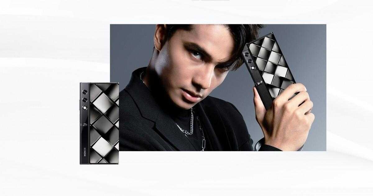 Камера смартфона Huawei nova 11 SE с двумя объективами и золотой ободкой на черном корпусе