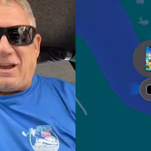 Мужчина с солнечными очками показывает умные часы Apple Watch Ultra