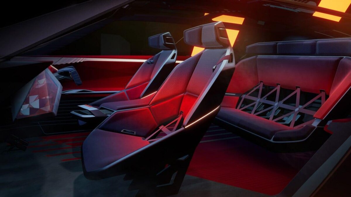 Интерьер будущего автомобиля Nissan Hyper Adventure с современными сиденьями и рулевым колесом