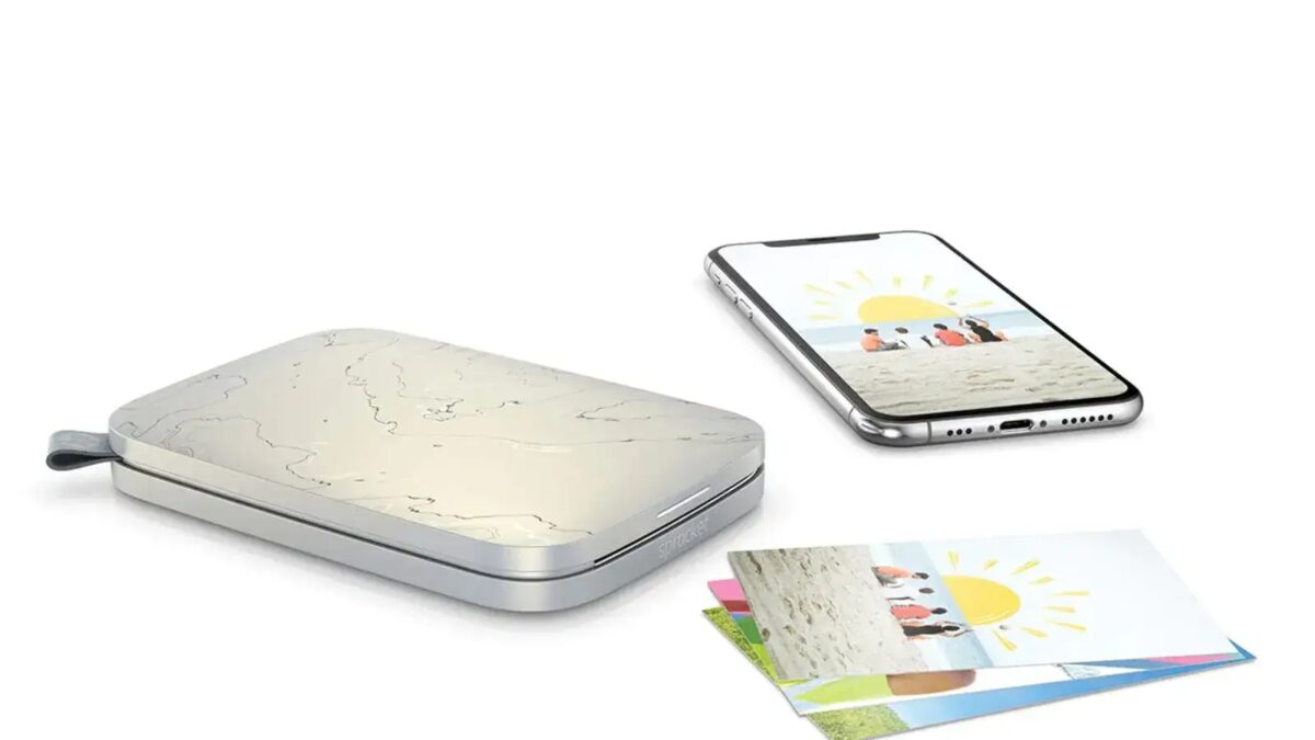 Лучшие фотопринтеры Epson, Canon и HP в 2024 году. Часть 2 6 hp sprocket portable shown beside a photo and a phone