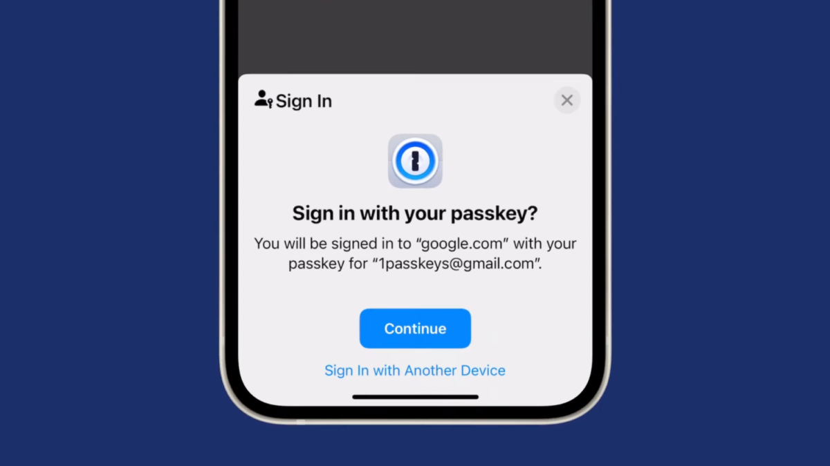 Экран смартфона с диалогом входа через Passkey на сайте google com