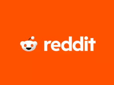 Красный фон с логотипом Reddit и текстом reddit's