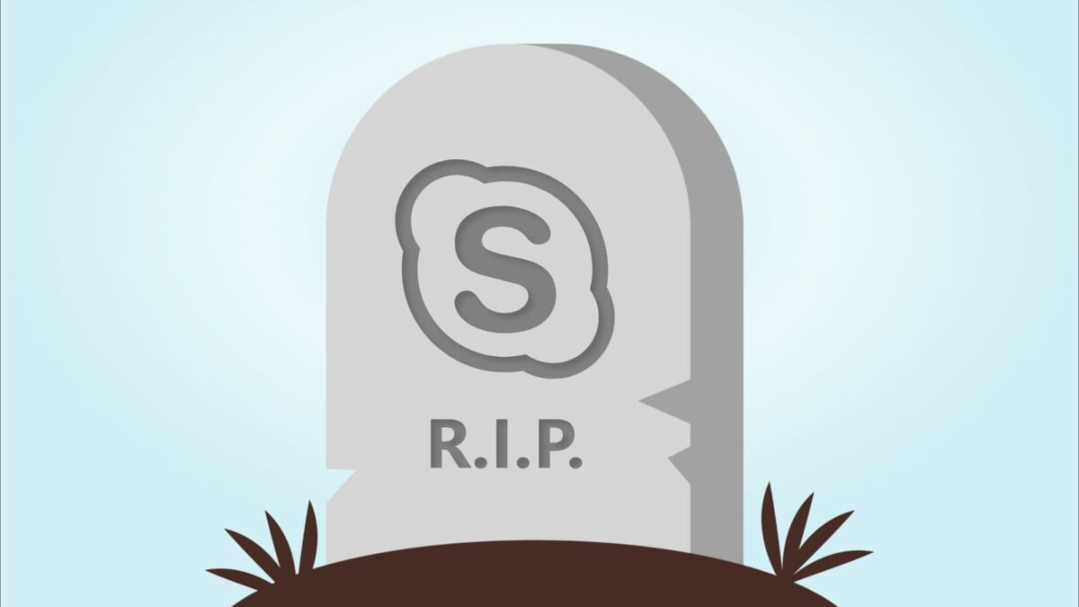 Могильное надгробие с надписью R I P и изображением мозга, символика про прощание со Skype