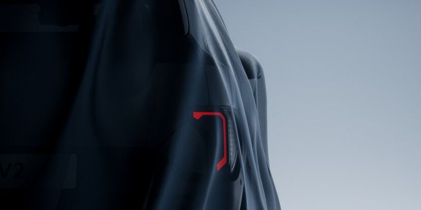 Боковой ракурс электрокроссовера Kia EV2: серийный EV2 в тёмной окраске