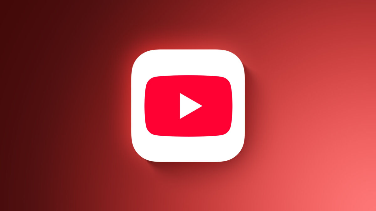 Логотип YouTube на экране смартфона с красным значком на белом фоне