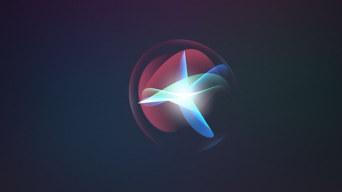 Логотип Siri на темном фоне с яркими цветными эффектами
