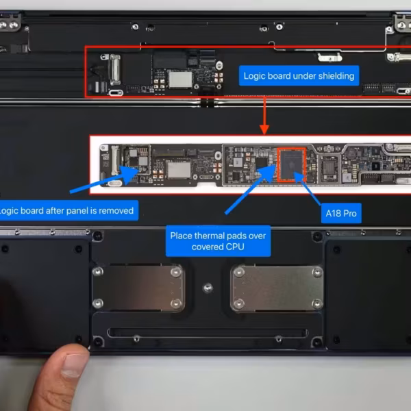 Разобранный MacBook Neo: логические платы и тепловые прокладки внутри устройства