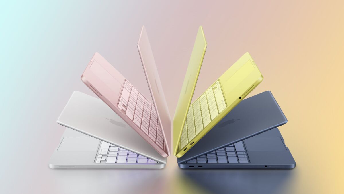 MacBook Neo в пастельных цветах, на которых запускают Windows 11 в виртуальной машине Parallels