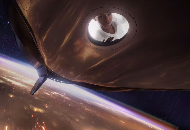 Космический корабль SpaceX на орбите с человеком в иллюминаторе