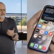 Человек в черной рубашке держит телефон Apple в руке с приложениями на экране