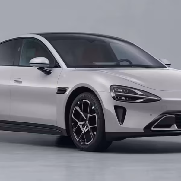 Современный белый электромобиль Volkswagen Passat с агрессивным дизайном